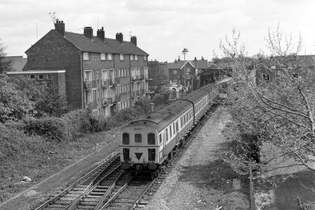 BR(S) Class 207 207017 at Cosham, Hampshire with the 12.51pm Portsmouth Harbour - Eastleigh service on Wednesday 26 Apr 1989 - J. Scrace [233925]