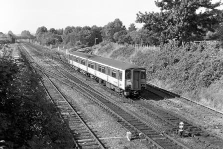 BR(W) Class 150 150266 at Sutton Bridge Junction, Shropshire with the 5.20am Swansea - Shrewsbury service on Saturday 27 May 1989 - J. Scrace [233927]