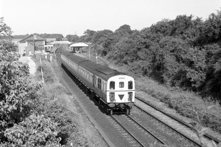 BR(S) Class 207 207005 at Whitchurch, Hampshire with the 8.15am Reading - Salisbury service on Wednesday 10 Jul 1991 - J. Scrace [233953]