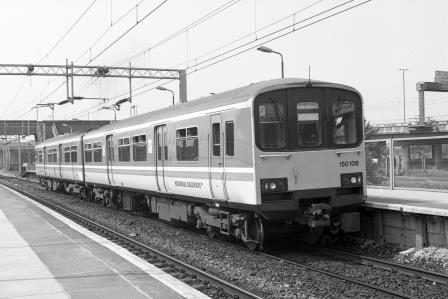 BR(M) Class 150 150106 at Bescot Stadium Station, West Midlands with the 2.28pm Hednesford - Birmingham New Street service on Friday 22 May 1992 - J. Scrace [233961]