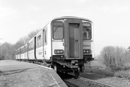 BR(W) Class 150 150240 at Gunnislake Station, Cornwall with the 5.35pm Gunnislake - Plymouth service on Thursday 11 Mar 1993 - J. Scrace [233968]