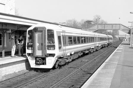 BR(S) Class 159 159004 at Gillingham (Dorset) Station, Dorset with the 12.17pm Exeter St Davids - Waterloo service on Monday 15 Mar 1993 - J. Scrace [233970]