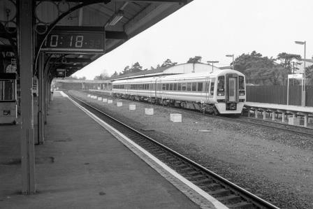 BR(S) Class 159 159004 at Andover Station, Hampshire with the 9.05am Yeovil - Waterloo service on Friday 26 Mar 1993 - J. Scrace [233972]