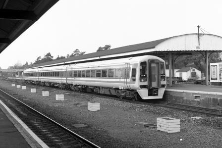 BR(S) Class 159 159004 at Andover Station, Hampshire with the 9.05am Yeovil - Waterloo service on Friday 26 Mar 1993 - J. Scrace [233973]