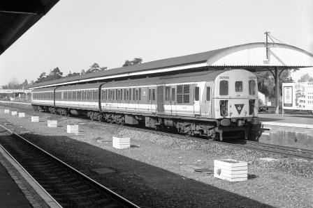 BR(S) Class 207 207010 at Andover Station, Hampshire with the 9.43am Salisbury - Basingstoke service on Tuesday 20 Apr 1993 - J. Scrace [233980]