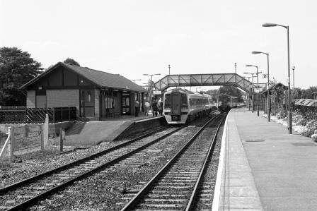 BR(W) Class 158 158831 & BR(W) Class 150 150261 at Trowbridge Station, Wiltshire with the 1.20pm Portsmouth Harbour - Cardiff service on Tuesday 17 Aug 1993 - J. Scrace [233995]