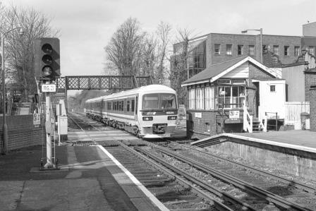 NSE Class 166 166216 at Reigate Station, Surrey with the 9.33am Reading - Gatwick Airport service on Thursday 24 Mar 1994 - J. Scrace [234034]