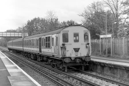 NSE Class 205 205009 at Nutfield Station, Surrey with the 12.47pm Tonbridge - Reigate service on Friday 06 May 1994 - J. Scrace [234038]