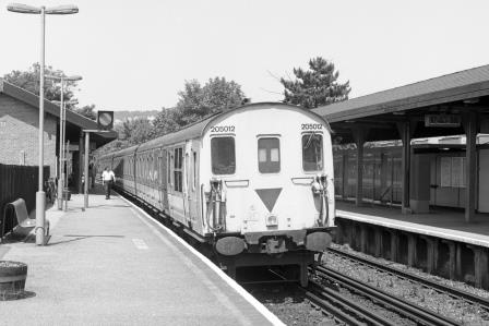 NSE Class 205 205012 at Oxted Station, Surrey with the 2.00pm Uckfield - East Grinstead service on Tuesday 12 Jul 1994 - J. Scrace [234050]