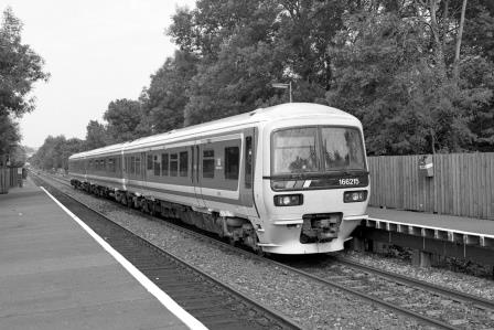 NSE Class 166 166215 at Deepdene Station, Surrey with the 5.03pm Gatwick Airport - Reading service on Saturday 08 Jul 1995 - J. Scrace [234087]
