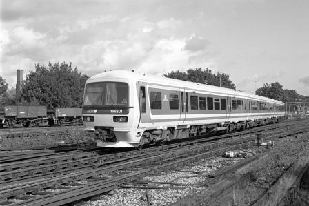 NSE Class 166 166201 at Redhill, Surrey with the 9.34am Reading - Gatwick Airport service on Tuesday 12 Sep 1995 - J. Scrace [234103]