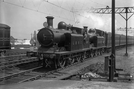 LBSCR E4 class 500 & LBSCR E5 class 587 at Clapham Junction, Greater London with an ECS working to Eardley Carriage Sidings on Saturday 30 Apr 1921 - H.C. Casserley [270063]