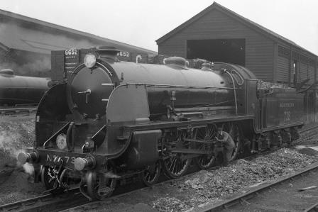 LSWR Class N15 E738 'King Pellinore' at Salisbury Shed, Wiltshire on Bank Holiday Monday 27 May 1929 - H.C. Casserley [270549]