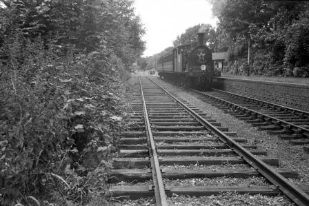 SR M7 class 128 at Bisley Camp Station, Surrey with an Arrival from Brookwood on Saturday 12 Jul 1947 - J.H. Aston [275060]