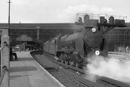 SR LN class 859 'Lord Hood' at Waterloo Station, Greater London with the 6.00pm to Plymouth on Monday 21 Jul 1947 - J.H. Aston [275073]