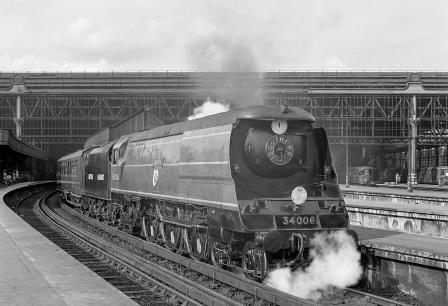 BR(S) West Country class 34006 'Bude' at Waterloo Station, Greater London with the 6.0pm Plymouth departure on Thursday 17 Jun 1948 - J.H. Aston [275269]