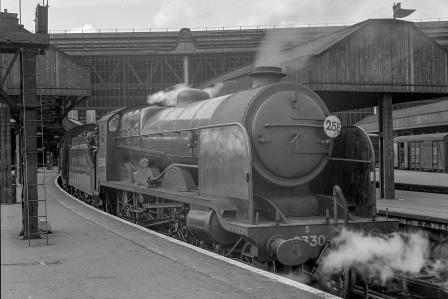 BR(S) Remembrance class S2330 'Cudworth' at Waterloo Station, Greater London with the 6.07pm Basingstoke departure on Thursday 17 Jun 1948 - J.H. Aston [275270]