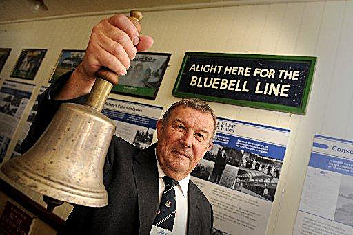 Bluebell Railway Museum Curator with station bell