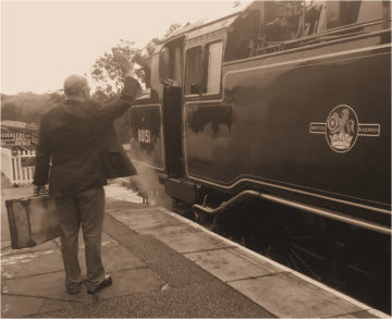 passenger waves to the crew